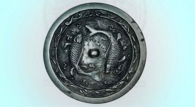​金代最出色铜镜——双鱼镜：古代先人以鱼寓意女性，寄托生殖崇拜
