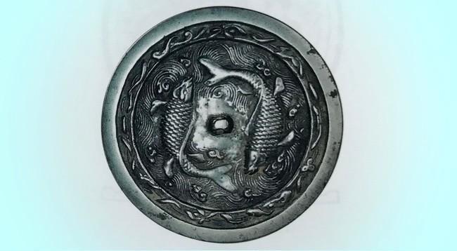 金代最出色铜镜——双鱼镜：古代先人以鱼寓意女性，寄托生殖崇拜