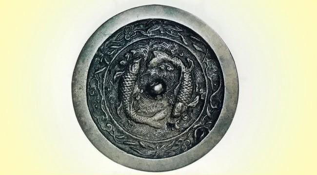 金代最出色铜镜——双鱼镜：古代先人以鱼寓意女性，寄托生殖崇拜