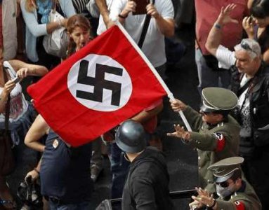 ​德国纳粹26年，为何选用“卐”作为标志？希特勒野心不止于此